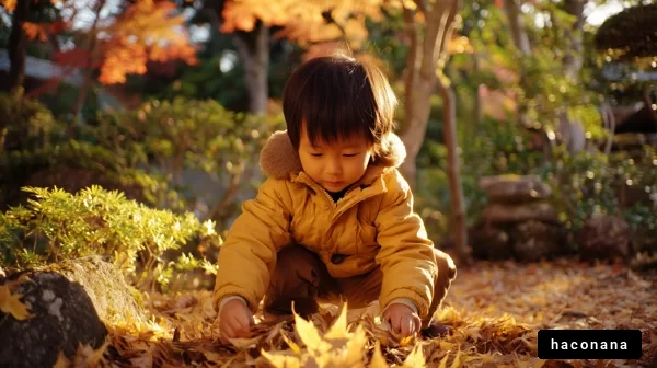 秋の葉と子供の笑顔
