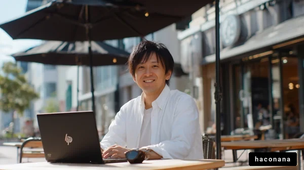 カフェで仕事をする男性