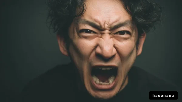 怒りを表現する男性