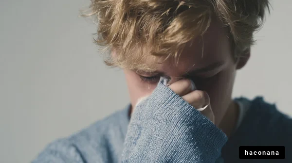 悲しみを抱える青年