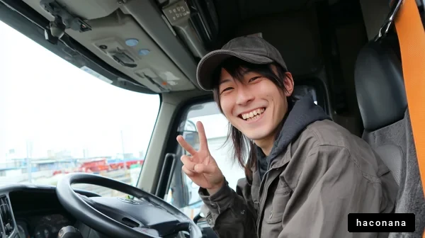 運転する人の笑顔