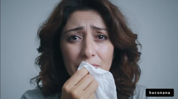 悲しみに暮れる女性