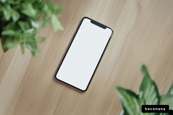 空のスマートフォンと植物