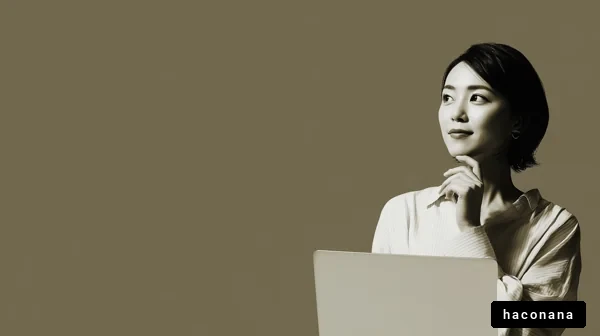 ビジネスシーンで考える女性