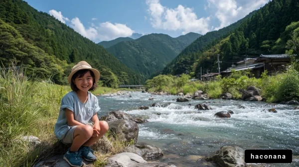 川辺で遊ぶ子ども