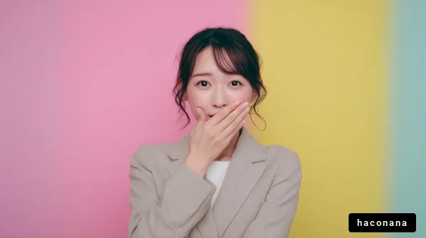 驚きを隠す女性の表情