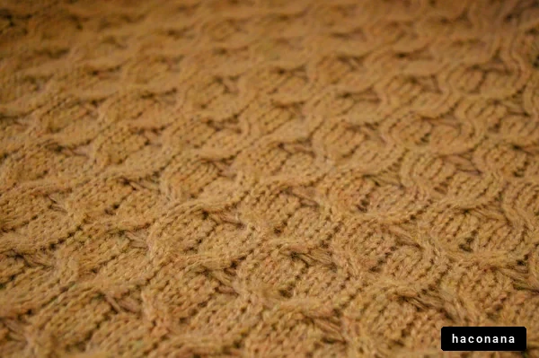 暖かい編み物の模様