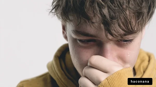 悲しみを抱える若者