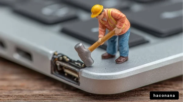 ミニチュアの作業者とパソコン