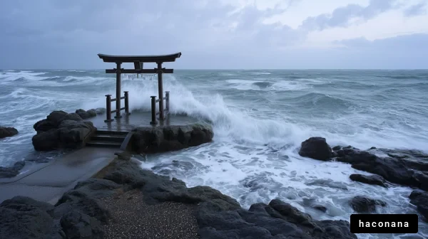 荒れた海と鳥居の風景