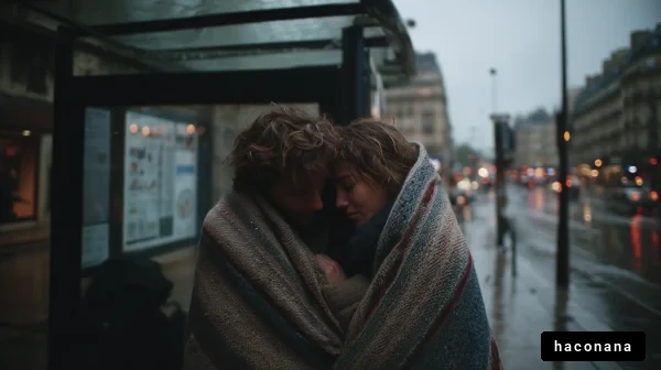 雨の中で寄り添う二人