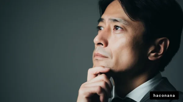 考え込むビジネスマンの姿