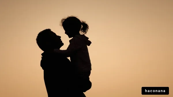 親子のシルエットの夕日