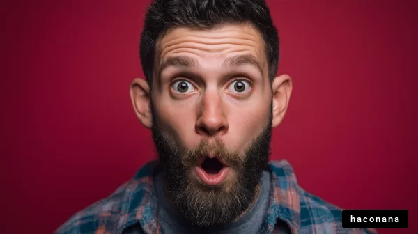 驚きの表情を持つ男性