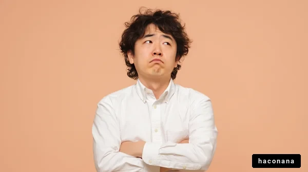 不満を抱える男性の表情