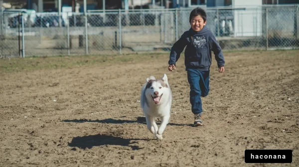 子供と犬の楽しげな瞬間