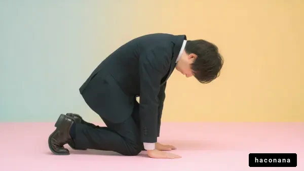 謝罪の姿勢を示すビジネスマン