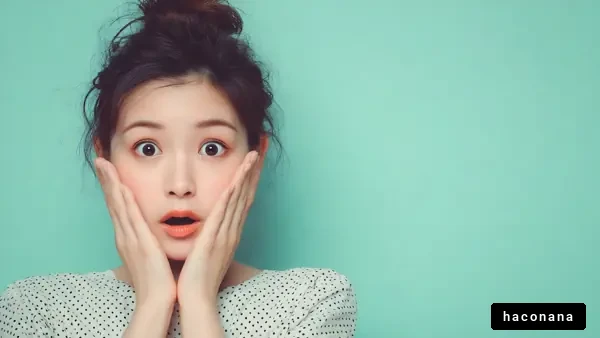 驚きの表情を持つ女性