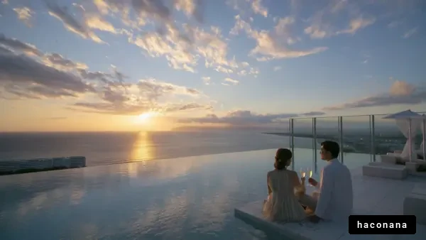 夕日を眺めるカップル