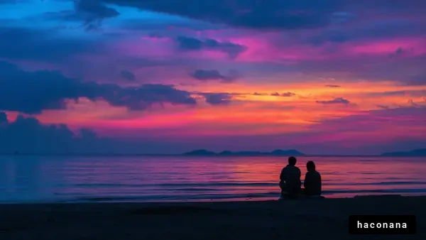 夕焼けのビーチでのふたり