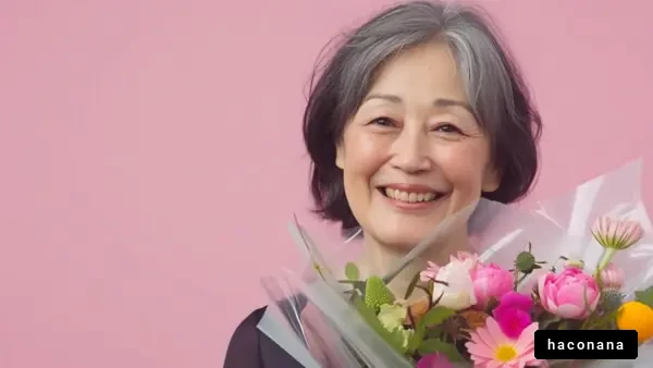 微笑む女性と花束