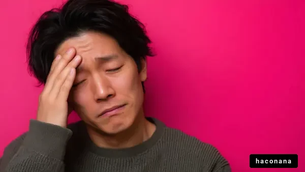 悩む男性の表情