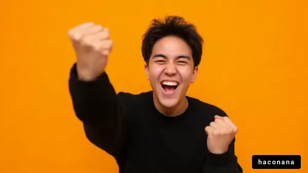 喜びを表現する若者