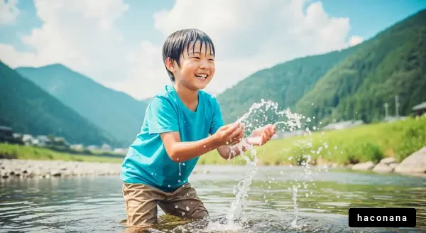 川遊びを楽しむ少年