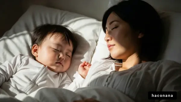 母親と赤ちゃんの寝顔