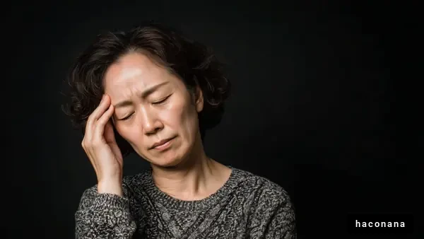 頭痛を抱える女性